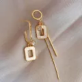 Elegant asymmetric gold earrings featuring marble rectangle pendants and long tassel detail - White Asymmetric Geometric Tassel Style (E1105 White)