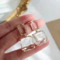 Elegant gold-plated drop earrings featuring clear square and rectangle crystals - Gold Geometric Crystal Style (E1579)