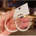 Large white and gold enamel hoop earrings on a white display card shown in detail - Gold White Patchwork Big Hoop Style (E1812 White)
