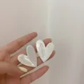White marble patterned heart-shaped stud earrings in minimalist alloy style. - Marble Pattern Heart Style (E1596) / White (E1596)