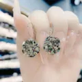 Close-up of elegant grey faceted crystal ball earrings with French hooks - Faceted Ball Style (E2555) / Gray
