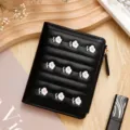 Black short wallet for women with elegant white floral embroidery and gold zipper - Black