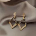 Elegant gold geometric dangle earrings with shimmering rhinestones and black enamel details - Geometric Rhombus Rhinestone Style (E0981) / Gold