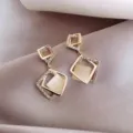 Elegant gold-toned geometric square drop earrings with shimmering cream stone inlay - Geometric Square Cat's Eye Style (E0545)