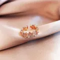 Elegant rose gold floral open ring with sparkling zirconia stones for a sophisticated look. - Continuous Small Flower Style (J0002) / Adjustable Open