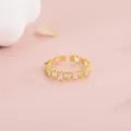 Trendy gold open ring featuring hollow hearts and sparkling clear zirconia stones - Heart Hollow Rhinestone Gold Style (J0047) / Adjustable Open