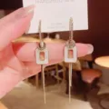 Elegant long gold tassel earrings featuring white enamel rectangle and S925 silver needle - 长款流苏釉面款式(E3238)