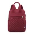 Lightweight burgundy diaper backpack with quilted front pocket and top handle - Burgundy