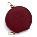 Burgundy round textured leather coin purse with gold-tone zipper and swivel snap hook - Red