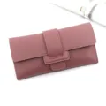 Elegant dusty rose long trifold wallet with a stylish buckle closure for women. - Rose Red (R911)
