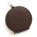 Compact circular coin purse in brown pebbled leather featuring a golden metal zipper. - Dark Coffee