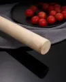 Detailed view of the smooth natural wood grain on a sturdy kitchen spatula handle - 80cm wooden handle