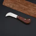 Curved gardening knife with wooden handle and stainless steel hook blade for harvesting - Model 4022IW Hawkbill Blade