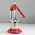 Professional red manual stainless steel fruit juicer press for citrus and pomegranates - Red