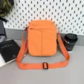 Einfache orangefarbene kleine Umhängetasche für das Handy mit verstellbarem Gurt - Orange