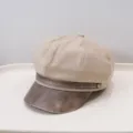 Close-up detail of women's beige retro newsboy hat with textured PU leather brim - Adult 55-58cm / Suede Beige