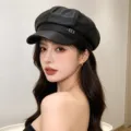 Detailed side view of a stylish black PU leather newsboy hat on an Asian model - Adult 55-58cm / Leather Black