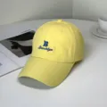Detail of yellow baseball cap featuring blue Brooklyn embroidery on quick-dry fabric - Brooklyn Style / Adult 55-58cm / Yellow