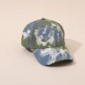Gros plan sur le motif tie-dye élégant et les œillets respirants de la casquette décontractée. - Adulte 55-58cm / Vert