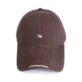 Brown baseball cap detail showing embroidered NB logo and brim lettering, casual style. - Adult 56-60cm / nb Coffee