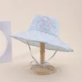 Detail view of floral print wide-brim sun hat with adjustable neck string - Adult 55-58cm / Blue and Purple Floral Print (14)