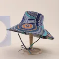 Detailed view of a wide-brimmed bucket hat with ethnic prints on a wooden stand - Adult 55-58cm / Ethnic Geometric Circle Print (17)