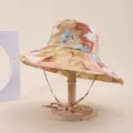 Close-up of wide-brim floral sun hat with adjustable chin strap for travel - Adult 55-58cm / Warm Botanical Floral Print (19)