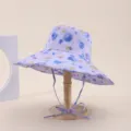 Detailed close-up view of purple polka dot print on the foldable wide-brim sun hat. - Adult 55-58cm / Light Purple Colorful Watercolor Polka Dot Print (26)