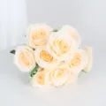 Detailed view of artificial champagne rose bouquet, perfect for romantic wedding decor. - Champagne