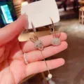Sparkling asymmetric rhinestone rabbit drop earrings with pearl detail, gold tone - Asymmetric Rabbit Style (E2977) / Gold