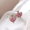 Elegant gold stud earrings featuring vibrant heart-shaped pink crystals for a romantic look - Heart-Shaped Pink Stud Earrings (E2499 Pink)