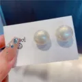 Elegant cream white round pearl stud earrings in minimalist retro Korean style for women - Creamy White Ball Style (E3025) / Cream