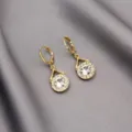 Elegant gold-tone leverback drop earrings with round white crystals on grey silk. - Round White Rhinestone Drop Earrings (E2524 Gold)