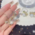 Elegant gold bowknot earrings with sparkling rhinestones and white pearls variant - Bow Pearl Hoop Hook Style (E2356 Gold White) / E2356 Gold White