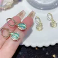 Elegant flower bud hoop earrings featuring sparkling rhinestones and turquoise cat-eye stone - Tulip Cat Eye Stone Hoop Style (E2373 Gold Blue) / E2373 Gold Blue