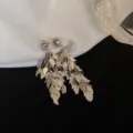Elegant silver leaf fringe tassel drop earrings with vintage Korean style design - Twisted Leaf Tassel Style (E3038) / Silver