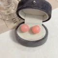 Elegant retro pink round spherical stud earrings displayed in a grey velvet jewelry gift box - Simple Ball Style (E3069) / Pink
