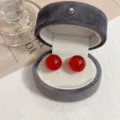 Elegant minimalist round red stud earrings inside a premium grey velvet jewelry box - Simple Ball Style (E3069) / Red