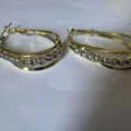 Elegant three-row gold hoop earrings featuring row of sparkling purple crystals - Purple Rhinestone Hoop Style (E2702 Gold Purple)