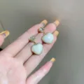 Elegant French vintage gold heart earrings featuring a pearlescent finish and crystal stud - Heart Pearl Style (E2714 Gold)