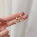 Minimalist gold-toned rectangular drop earrings with a polished finish for elegant wear - Geometric Rectangular Stud Earrings (E1375) / Gold