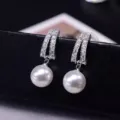 Elegant silver double-row rhinestone hoop earrings with a dangling white round pearl - U-Shaped Rhinestone Artificial Pearl Dangle Style (E1334) / Silver