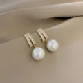 Elegant high-end gold plated pearl drop earrings featuring sparkling crystal pavé accents - White Rhinestone Artificial Pearl Dangle Style (E1334) / Gold