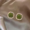 Elegant olive green square stud earrings with sparkling crystal halo on silk background - Olive Green Square Pave Rhinestone Studs (E1340) / Gold