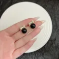 Vintage gold bow stud earrings with glossy black pearl beads for women's elegant style - Bowknot Black Bead Stud Earrings (E4250) / Black