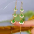 Elegant vintage gold dangling earrings featuring three-tier green stones and ginkgo leaf design - Ginkgo Leaf Green Cat's Eye Stone Style (E2772 Gold Green)