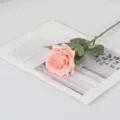 Single stem artificial moisturizing rose in peach pink for home and hotel table decor - Coral Pink