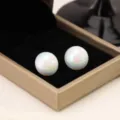 Elegant iridescent rainbow pearl stud earrings presented in a luxury golden jewelry box - Large Diameter Round Bead Style (E3530) / Holographic White (E3530 Round Colorful)