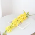 Fausse branche de delphinium jaune pour la décoration de mariage à la maison et compositions. - Jaune