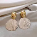 Elegant vintage gold-toned earrings with textured shell-shaped pendants - Fan-Shaped Shell Stud Earrings (E3267) / Gold + Silver